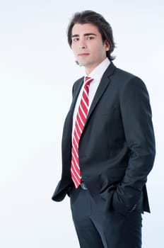 Confident young business man isolated on white background