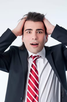 Worried businessman isolated on white background
