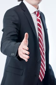A business man with an open hand ready to seal a deal