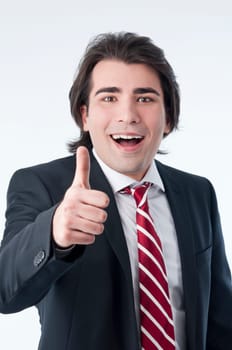 Man gesturing ok success sign isolated over white.