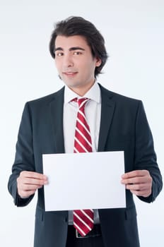 Businessman holding an empty advert in his hands