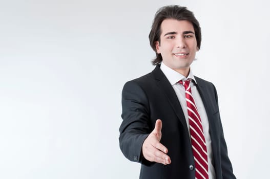 A business man with an open hand ready to seal a deal
