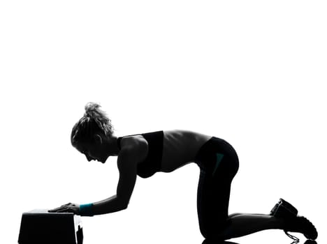 one woman exercising workout fitness aerobic exercise abdominals push ups posture on studio isolated white background