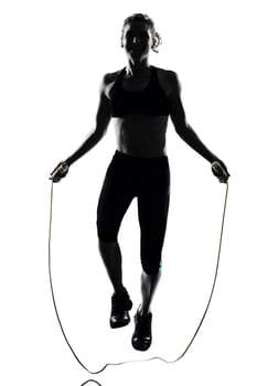 woman workout fitness posture body building jumping rope exercise exercising on studio isolated white background