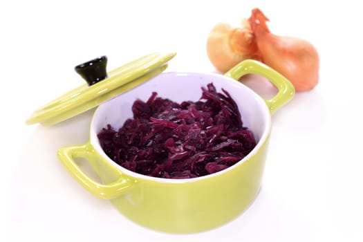 a pot filled with red cabbage