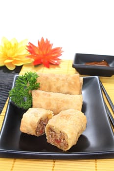 a spring roll filled with minced meat and tomatoes