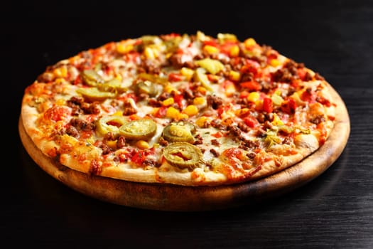 Tradition Mexican pizza with chili, beef and onion