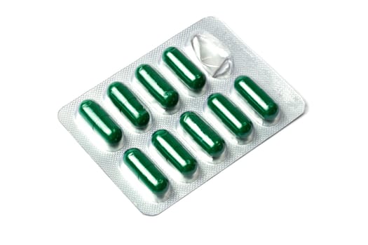 Green capsules packed in blister
