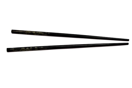 Black chopsticks isolated on white background