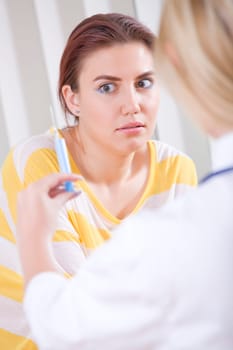 female patient has fear of syringe injection