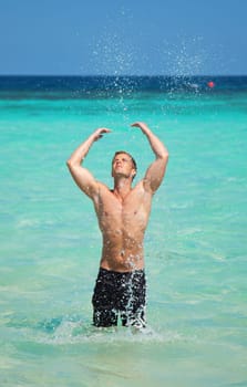active,adult,beach,beautiful,energy,fun,happy,health,healthy,holiday,hot,lifestyle,looking,male,man,men,nature,ocean,one,outdoors,people,person,play,playing,sand,sea,season,sky,splash,splashing,summer,travel,tropical,vacation,water,wet,young,muscular,musc