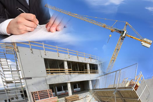 signing a contract for the construction of residential housing construction and background of blue sky