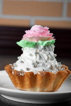 fresh baked cupcake on a wooden table