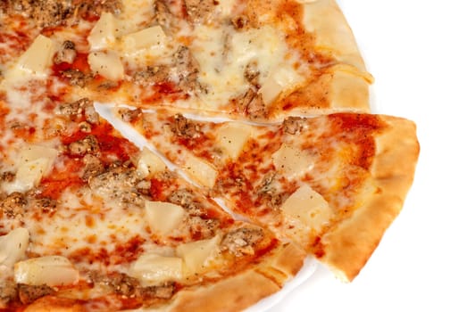 Hawaiian pizza with roasted chicken, pineapple, garlic and mozzarella cheese