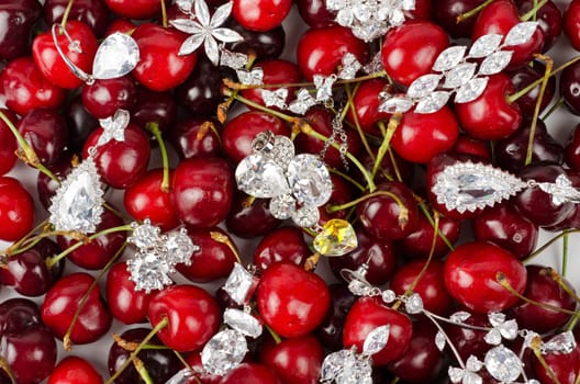 Jewels at fruit red ripe cherries berry background