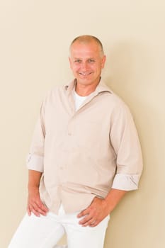 Casual businessman mature standing relaxing pose portrait