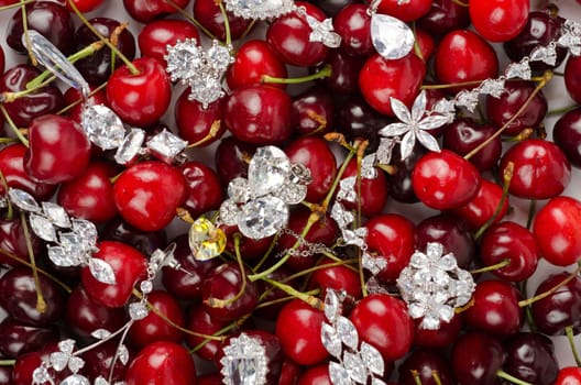 Jewels at fruit red ripe cherries berry background