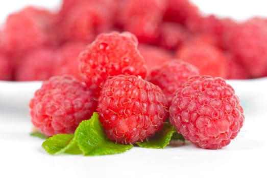 fresh raspberry closeup on a white background
