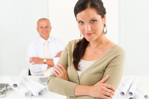 Professional architect woman attractive with blueprint in office