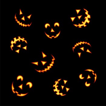 Halloween pumpkin faces lit brightly on black background