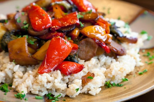 A healthy vegan dinner of brown rice and roasted vegetables