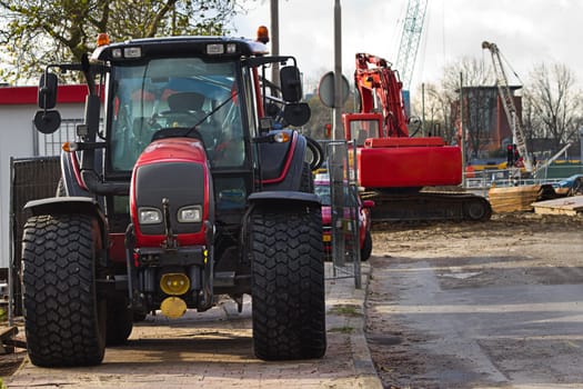 Streetwork in the city with tractor, draglines and caterpillar