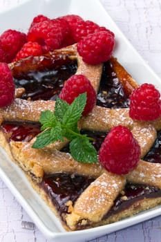 a raspberries tart with fresh fruits