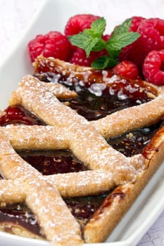 a raspberries tart with fresh fruits