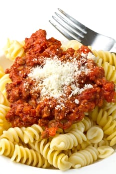 pasta with bolognese sauce with tomatoes, meat and parmesan cheese