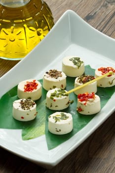 cheese with spices  on wooden background