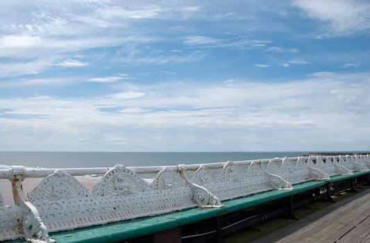 Old Victorian Era Benches on an English Seaside Pier