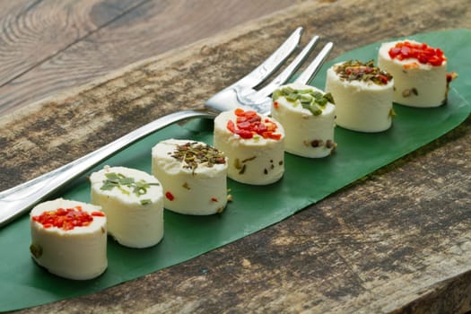 cheese with spices  on wooden background