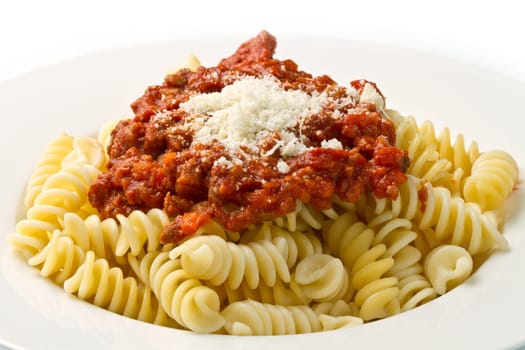 pasta with bolognese sauce with tomatoes, meat and parmesan cheese