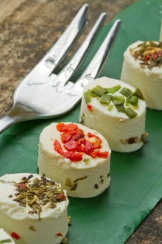 cheese with spices  on wooden background