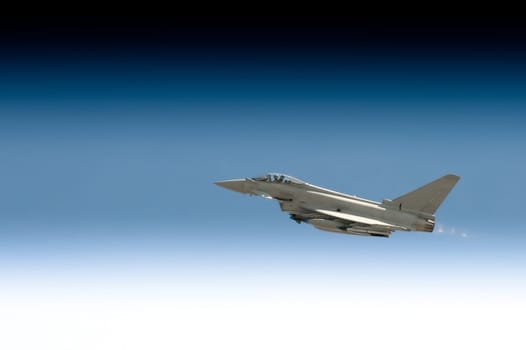 military fighter jet powering through a gradient sky