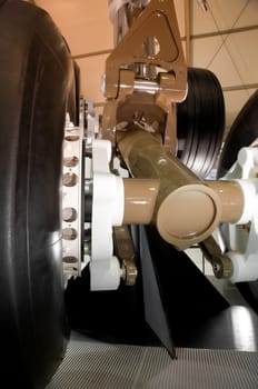 closeup of an undercarriage of a large aircraft