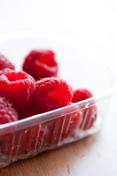Close-up of delicious fresh raspberries. Studio shot.