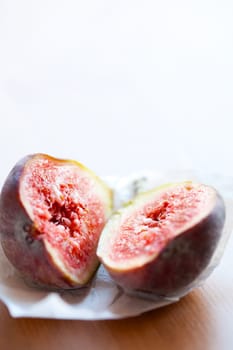 Delicious, fresh and ripe fig halves. Studio shot.