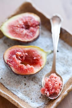Delicious, fresh and ripe fig halves. Studio shot.