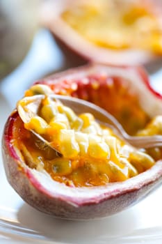 Delicious fresh passion fruit halves. Studio shot.