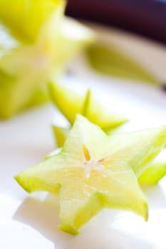 Slices of fresh and delicious Carambola fruit. Studio shot.