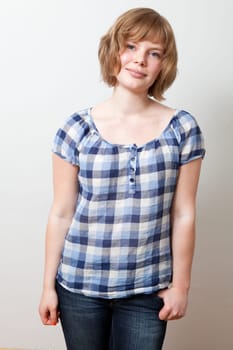 Portrait of a young beautiful woman. Studio shot.