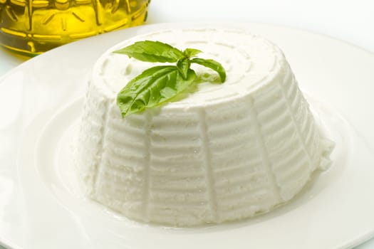 fresh ricotta with basil leaf