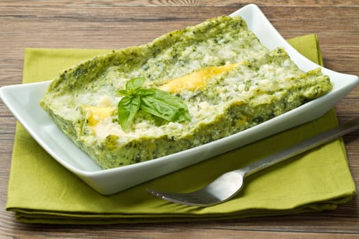 fresh lasagna with pesto sauce