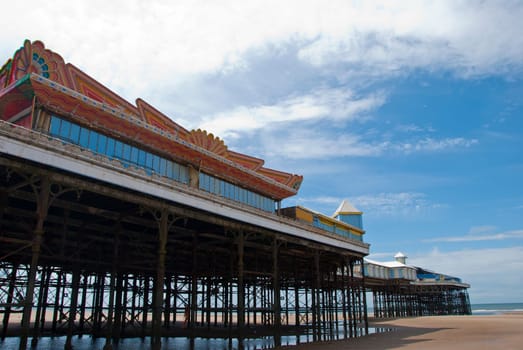The Victorian Central Pier at Blackpool from the beach looking towards the sea