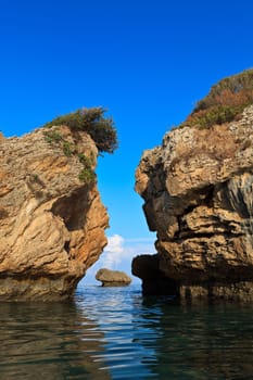 a beautiful reflection of stones in the sea