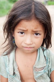Portrait of asian girl,child with dirty clothes in poverty