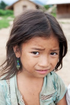 Portrait of asian girl,child with dirty clothes in poverty
