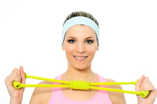 athletic woman doing gymnastic exercises with an elastic fitness