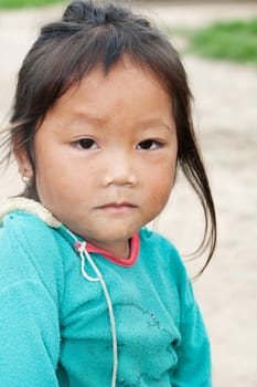 Portrait of asian girl,child with old clothes and dirty face